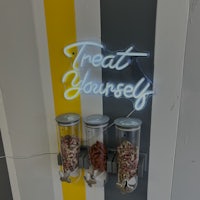 treat yourself neon sign